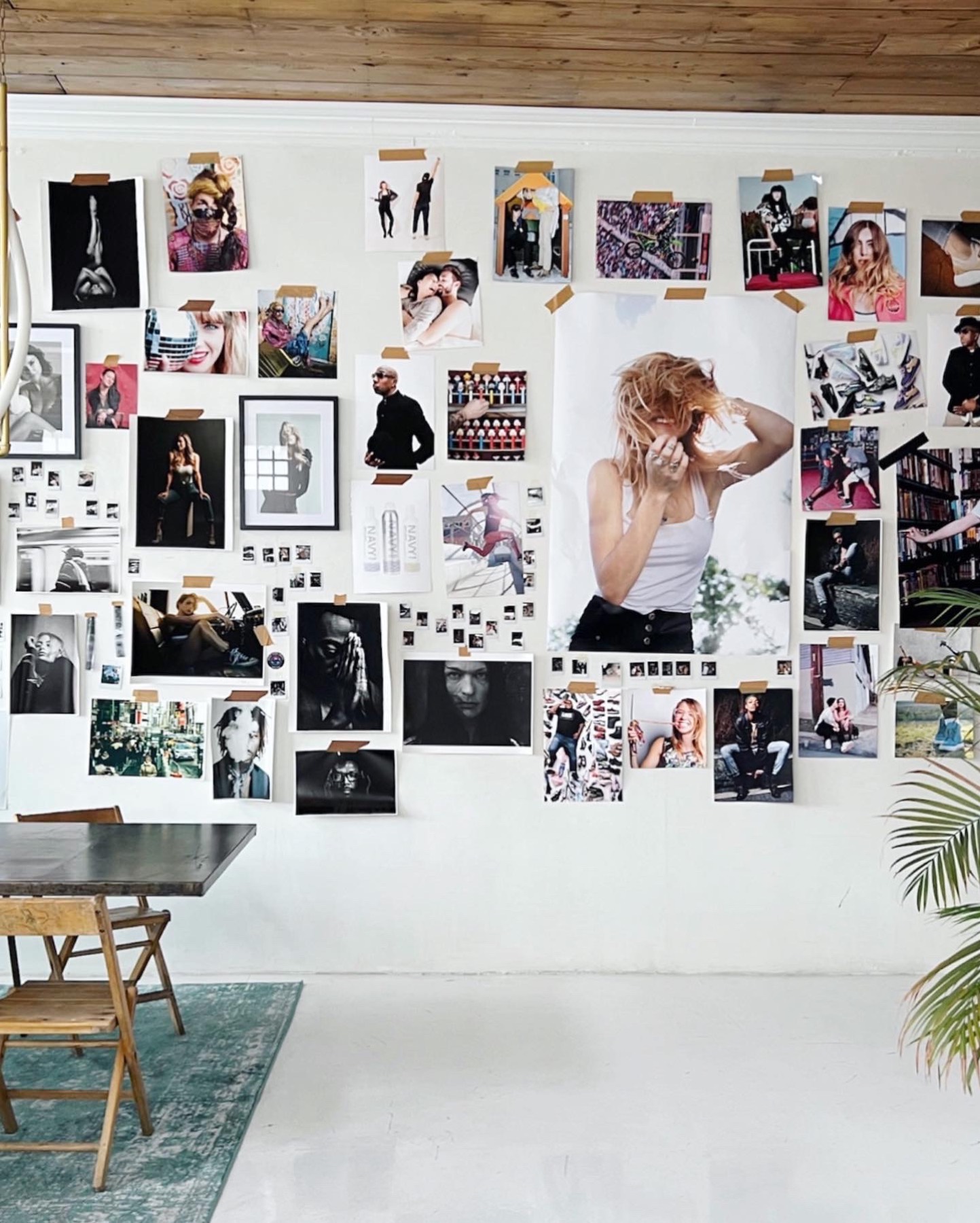 Wall of taped reference prints