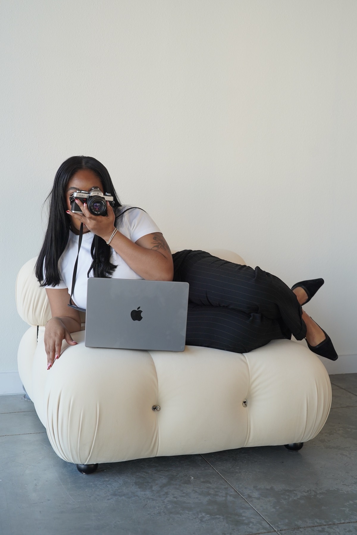 Shooting on location with a camera and laptop